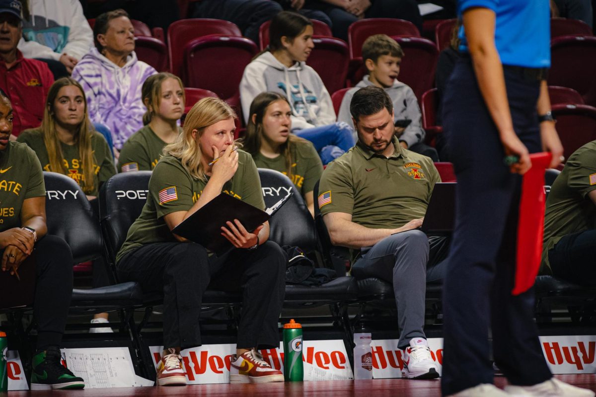 Coach Christy Johnson-Lynch during the Iowa State vs. University of Colorado Boulder volleyball game at Hilton Coliseum on Nov. 13, 2024. 