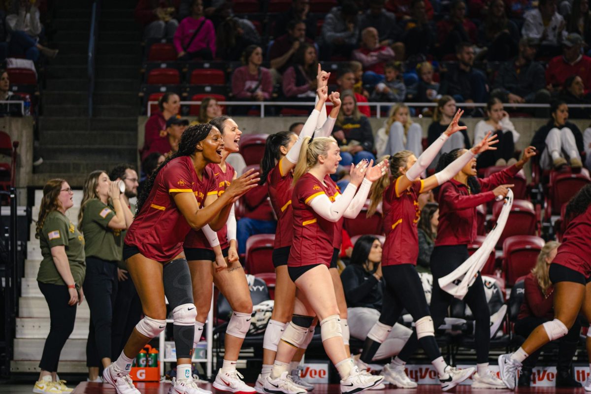 The Iowa State volleyball team celebrates during the Iowa State vs. University of Colorado Boulder volleyball game at Hilton Coliseum on Nov. 13, 2024.