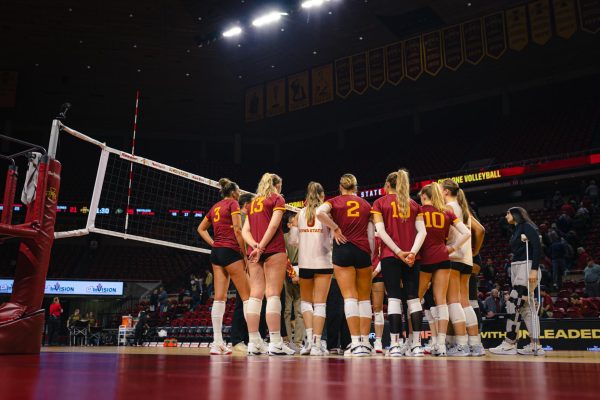 The Iowa State volleyball team huddled during the Iowa State vs. University of Colorado Boulder volleyball game at Hilton Coliseum on Nov. 13, 2024.