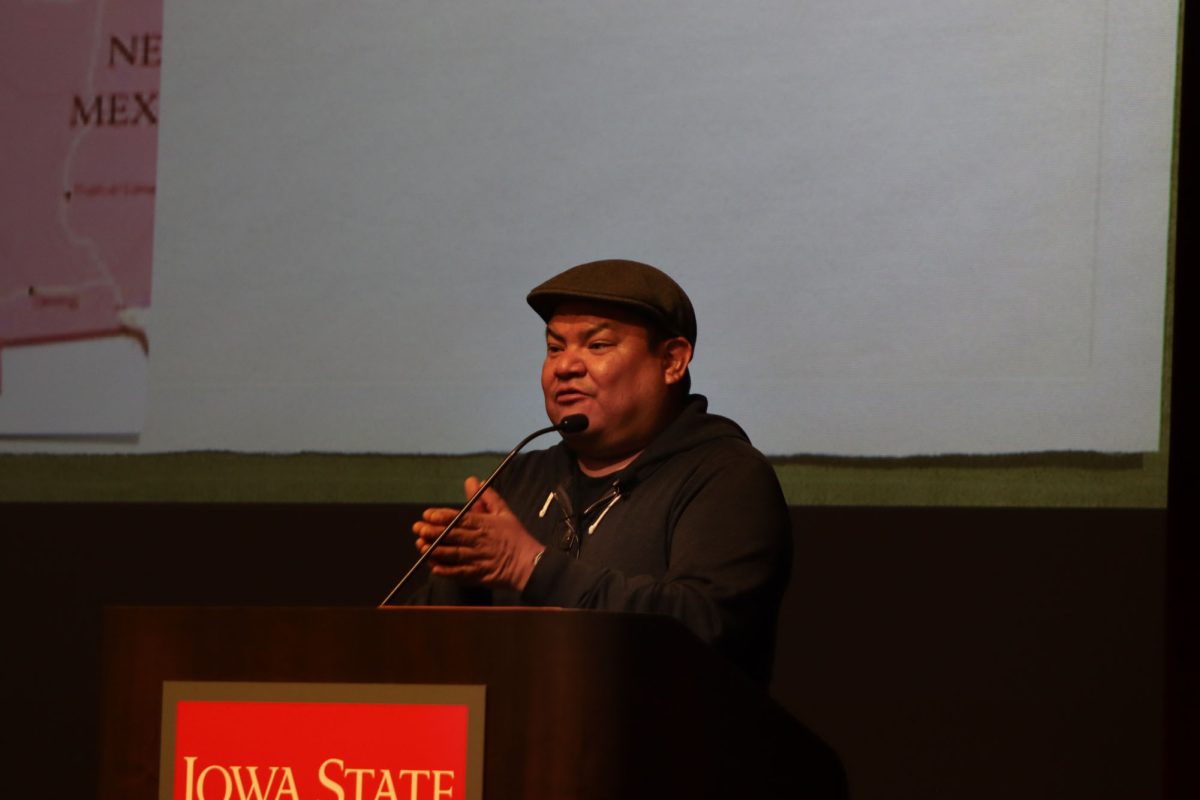 Freddie J. Bitsoie talks about his background and how he got into cooking at the Native American Foods lecture, Memorial Union, Ames, Iowa, Nov. 18, 2024. 