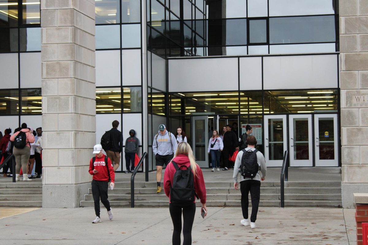 Students walking into Parks Library on Central Campus. Nov. 4, 2024.