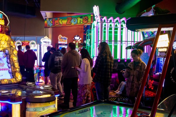 Iowa residents stand in line at Perfect Games to vote in the general election, Ames, Iowa, Nov. 5, 2024.