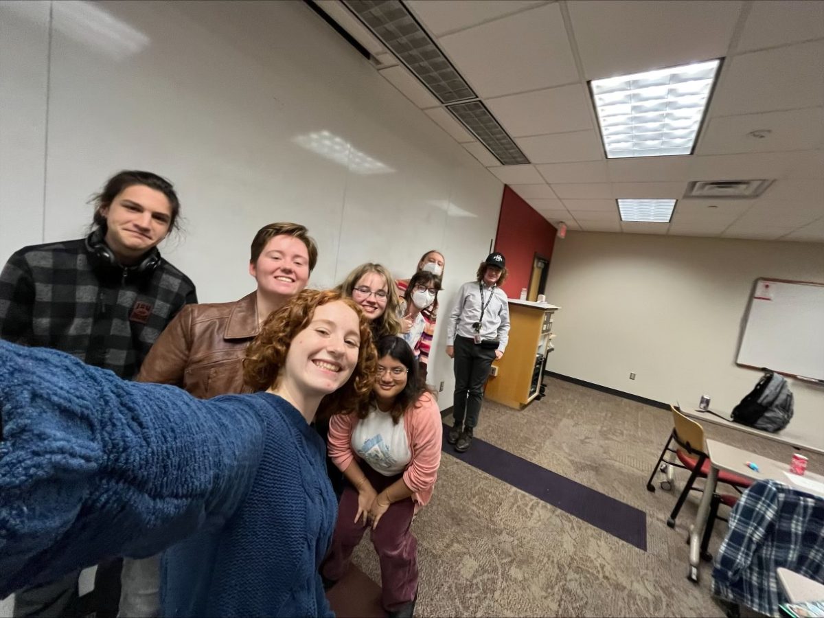 Kaylin Dains snaps a selfie with other members of the Alliance for Disability Awareness at their most recent gathering. Nov. 15, 2024. 