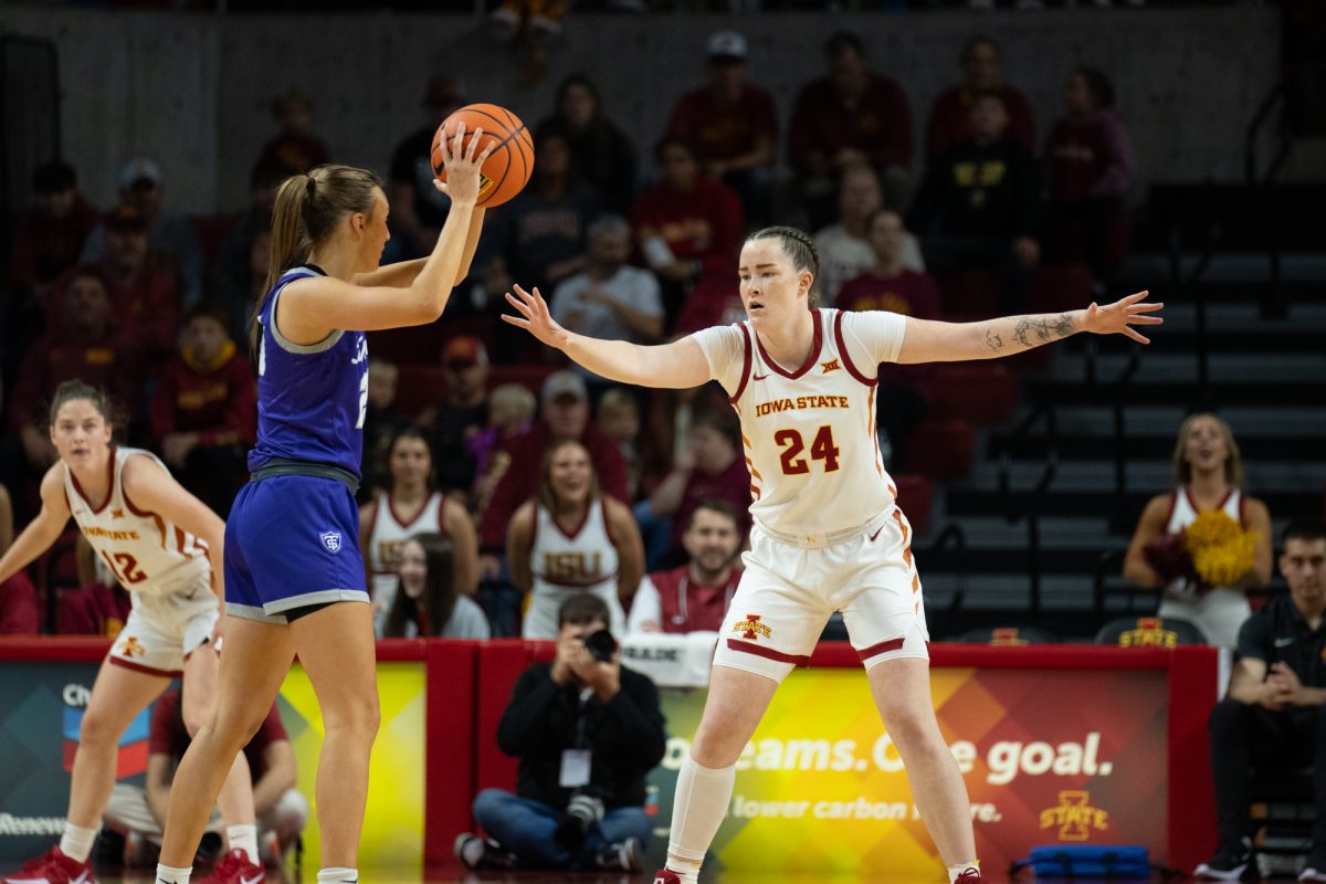 Addy Brown guards Alyssa Sand (24) during the game vs. University of St. Thomas, Hilton Coliseum, Ames, Iowa, Nov. 14, 2024.