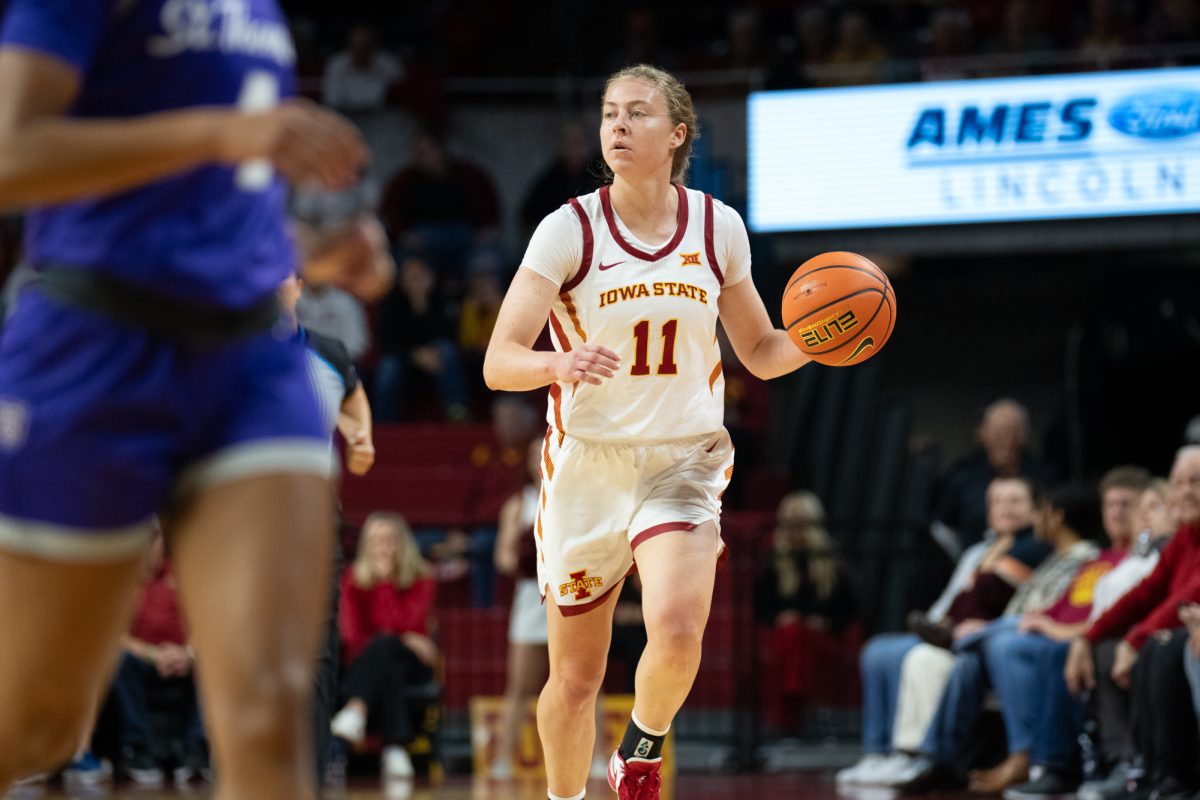 Emily Ryan dribbles the ball down the court during the game vs. University of St. Thomas, Hilton Coliseum, Ames, Iowa, Nov. 14, 2024.