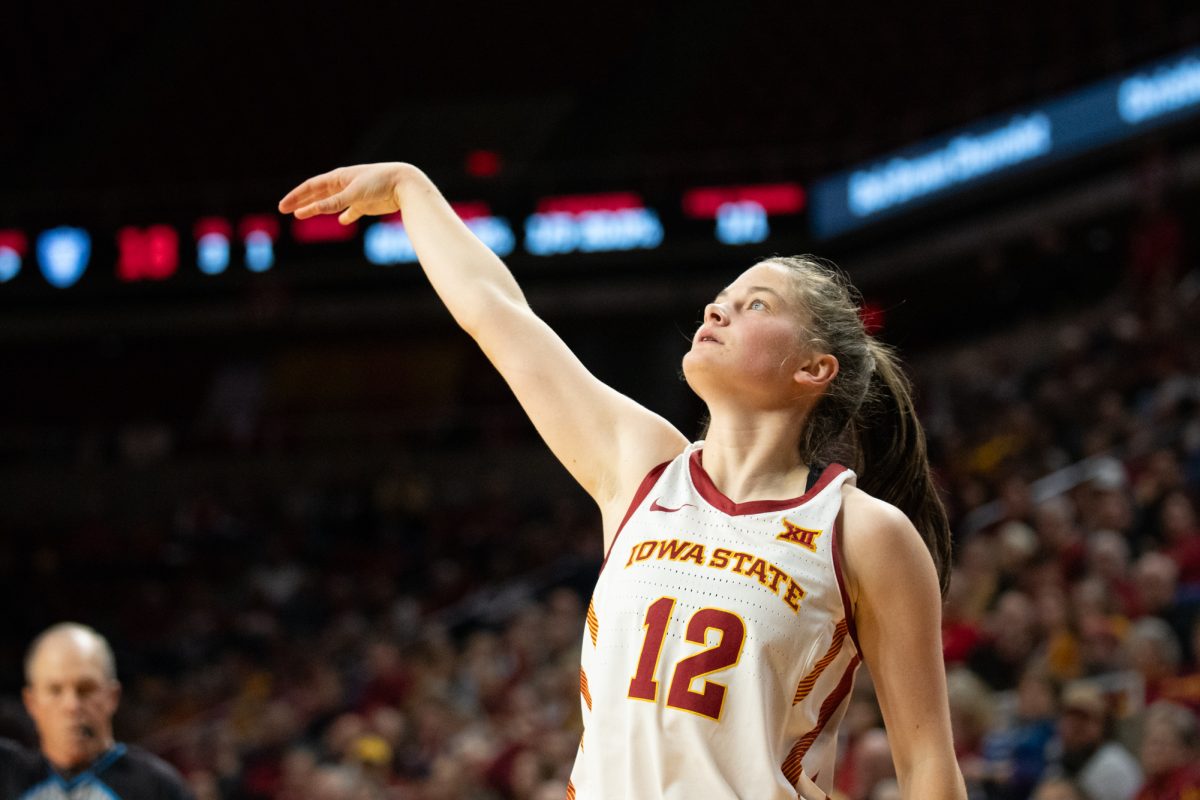 Kenzie Hare (12) watches the ball after shooting a three pointer during the game vs. University of St. Thomas, Hilton Coliseum, Ames, Iowa, Nov. 14, 2024.