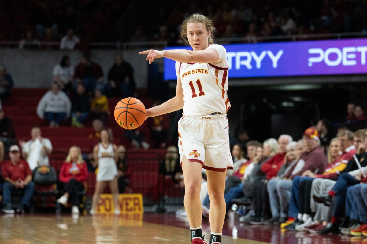 Emily Ryan (11) directs her teammates at the top of a play during the game vs. University of St. Thomas, Hilton Coliseum, Ames, Iowa, Nov. 14, 2024.