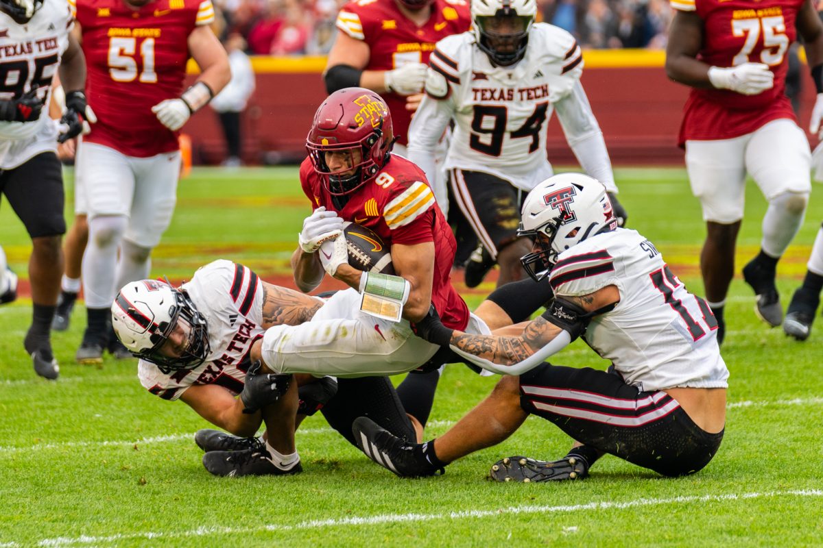 Jayden Higgins (9) gets tackled during the Iowa State vs. Texas Tech University football game at Jack Trice Stadium on Nov. 2, 2024.