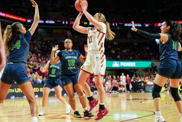 Iowa State Emily Ryan (11) goes for the layup with three Chicago State defenders around her, Cyclones win home opener game 96-56, Hilton Coliseum, Nov. 4, 2024.