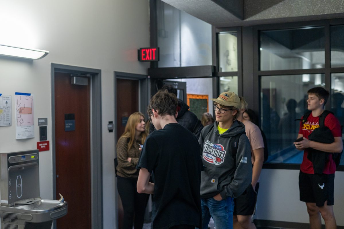 Iowa State students wait in a line to vote inside Maple Hall on Nov. 5, 2024