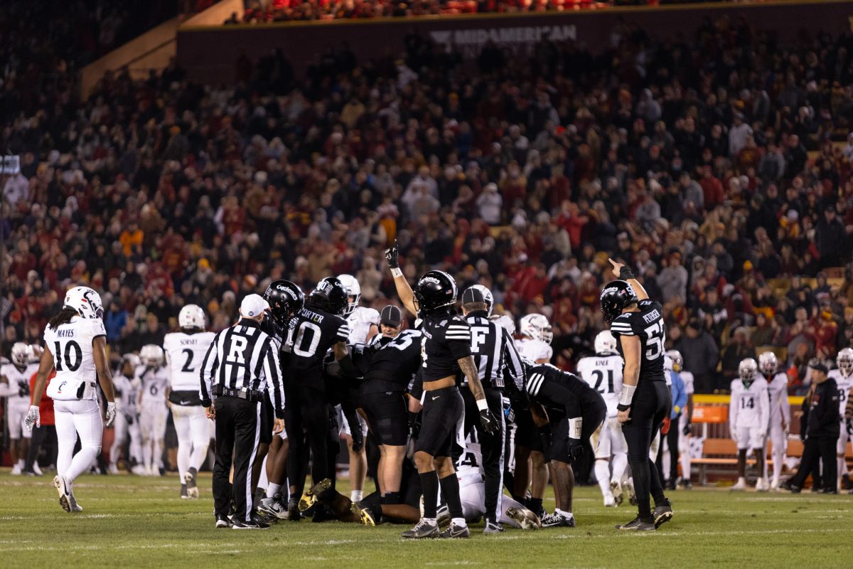 Jeremiah Cooper (4) signals a first down after a third down run during the Iowa State Cyclones and Cincinnati Bearcats game in Ames Iowa on Nov. 16, 2024.