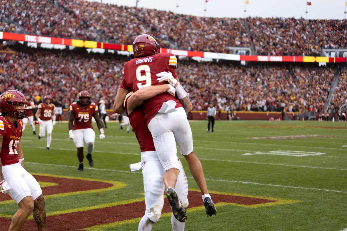 Jayden Higgins (9) celebrates with a teammate after scoring a touchdown late in the 2nd quarter during the Iowa State and Texas Tech game on Nov. 2, 2024