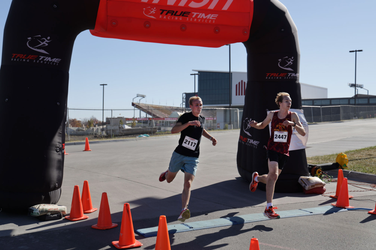 Runners take off from the starting line. More than 2,000 runners participated in Iowa State's Homecoming 5K on Sunday, Oct. 27, 2024. The money from entry fees was donated to Lutheran Services in Iowa, a local non-profit that provides services to children and families in Ames.