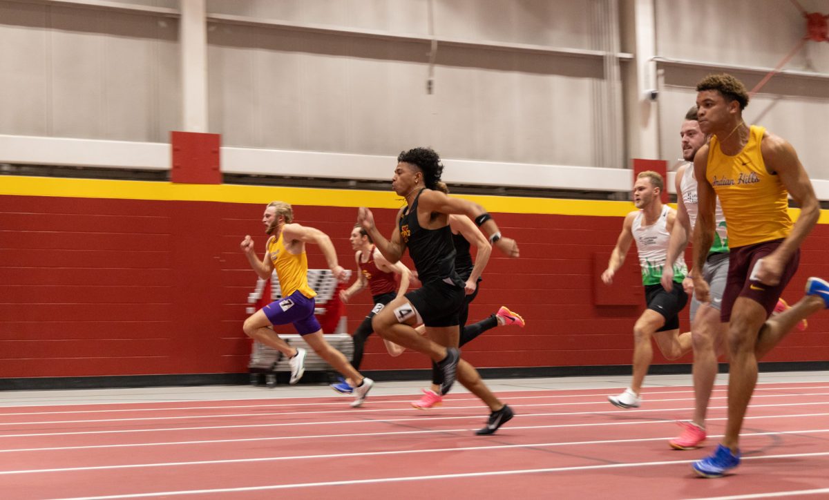 Thai Thompson runs the men's heptathlon at the Iowa State Holiday track invitational, Lied Recreation Athletic Center, Ames, Iowa, Dec.13, 2024. 
