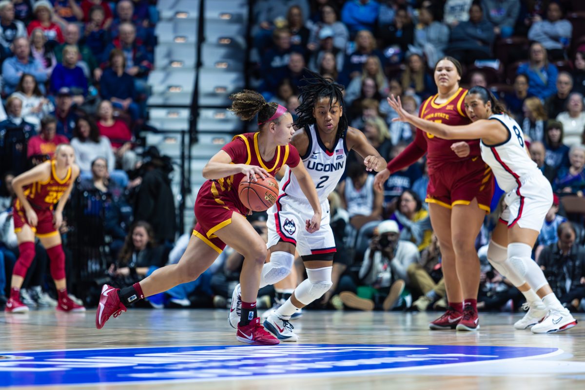 Guard Arianna Jackson (2) dribbles the ball during the Iowa State vs. University of Connecticut basketball game, Mohegan Sun Arena, Uncasville, CT, Dec. 17, 2024.