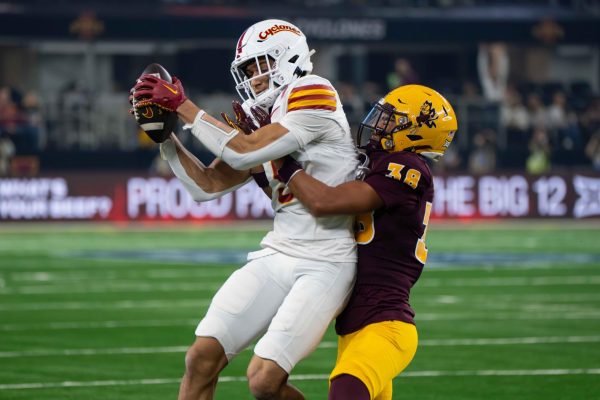 Wide Receiver Jayden Higgins (9) catches a pass during the Iowa State vs. Arizona State University Big 12 Championship football game at AT&T Stadium in Arlington, Texas on Dec. 7, 2024. 