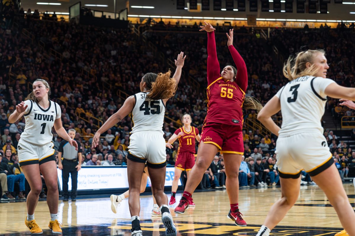 Sophomore center Audi Crooks (55) shoots for two, Carver-Hawkeye Arena, Dec. 11, 2024. The Hawkeyes beat the Cyclones 75-69 in the 50th Cy-Hawk matchup. 