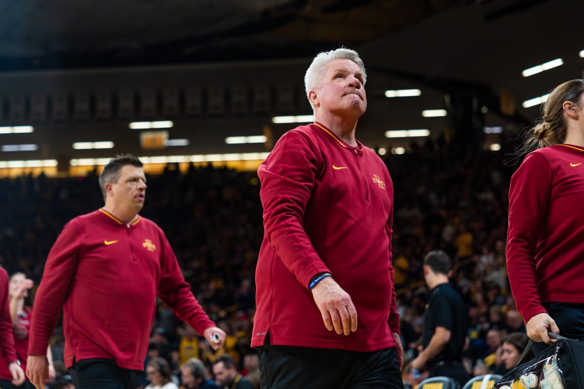 Iowa State women's basketball head coach Bill Fennelly looks toward the crowd while walking to the locker rooms at halftime, Carver-Hawkeye Arena, Dec. 11, 2024. The Hawkeyes beat the Cyclones 75-69 in the 50th Cy-Hawk matchup. 