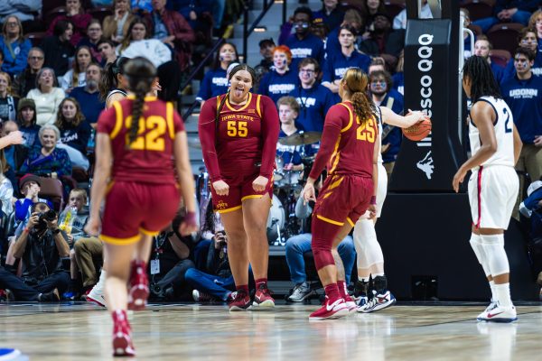 Center Audi Crooks (55) celebrates after making the basket and drawing the foul during the Iowa State vs. University of Connecticut basketball game, Mohegan Sun Arena, Uncasville, CT, Dec. 17, 2024.