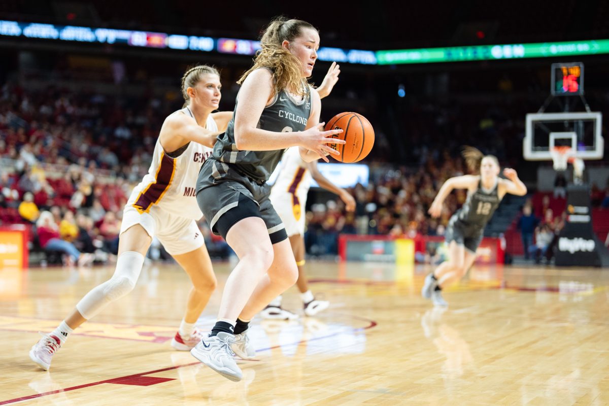 Addy Brown looks for an open teammate during the Iowa State vs. Central Michigan University women's basketball game at Hilton Coliseum on Dec. 8, 2024.