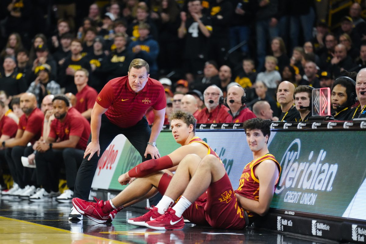 T.J. Otzelberger subs in Brandton Chatfield and Milan Momcilovic during the 2024 Cy-Hawk matchup, Carver-Hawkeye Arena, Iowa City, Iowa, Dec. 12, 2024.