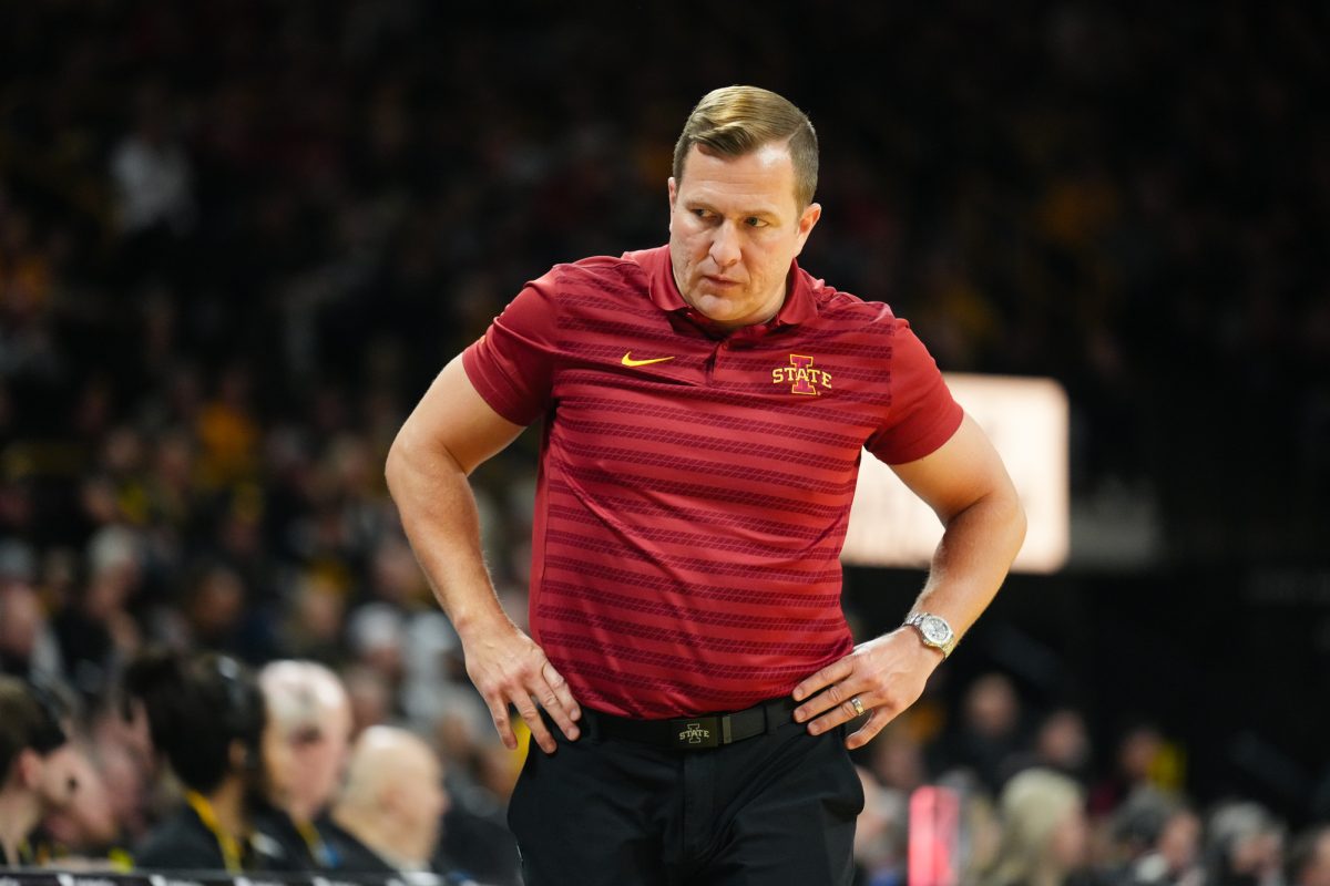 T.J. Otzelberger in disgust with hands on hip during the 2024 Cy-Hawk matchup, Carver-Hawkeye Arena, Iowa City, Iowa, Dec. 12, 2024.