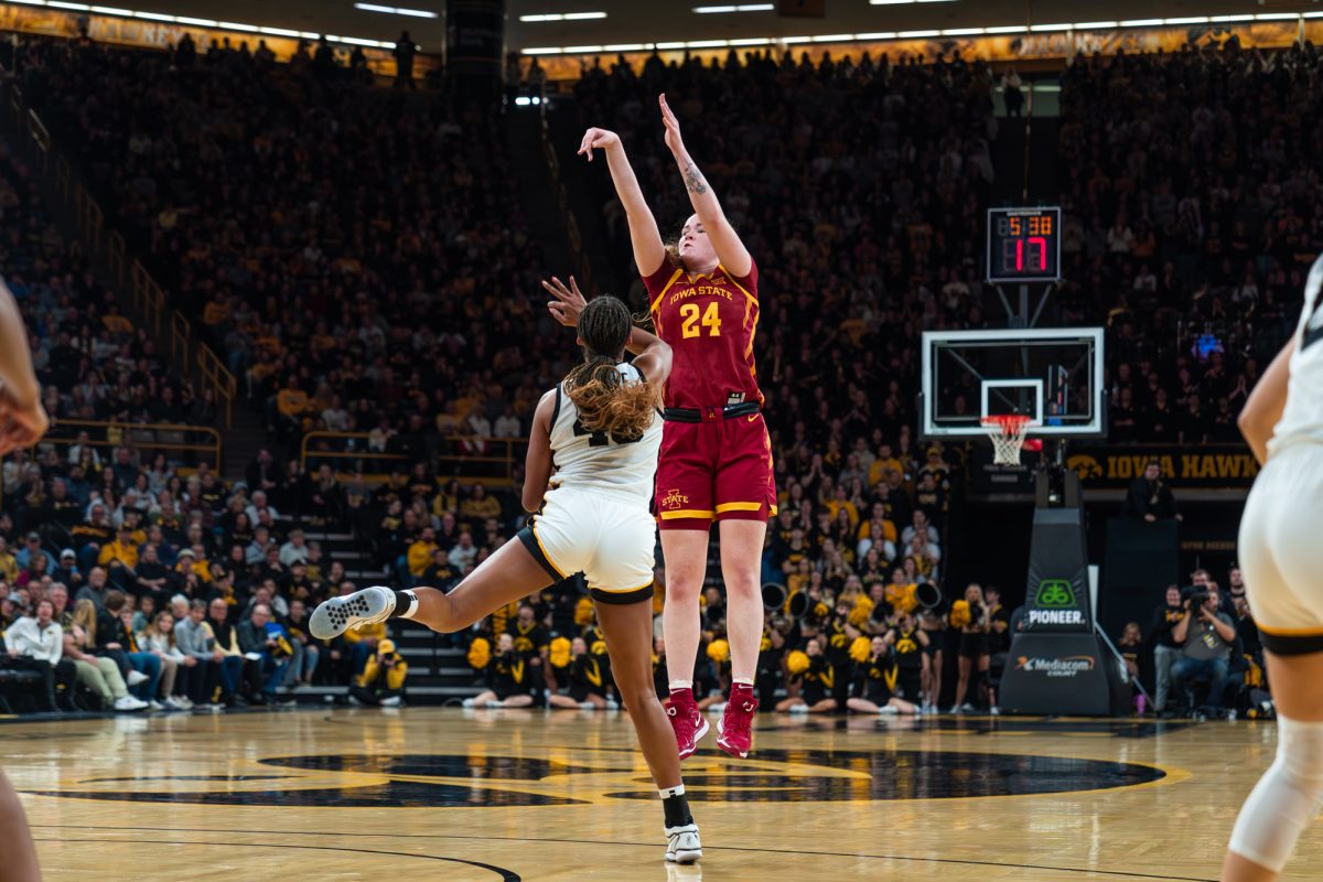 Sophomore forward Addy Brown (24) shoots for three, Carver-Hawkeye Arena, Dec. 11, 2024. The Hawkeyes beat the Cyclones 75-69 in the 50th Cy-Hawk matchup. 