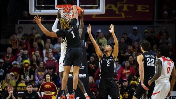 Dishon Jackson (#1) blocks a Morgan State player's shot at Hilton Coliseum on Dec. 22, 2024.