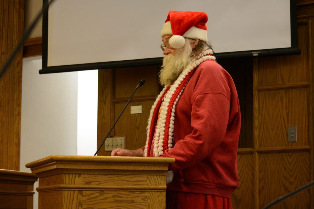 Richard Deyo asks Mayor John Haila what he would swear to if he could create his own oath of office during the Public Forum segment at Ames City Hall, Ames, Iowa, Dec. 10, 2024.