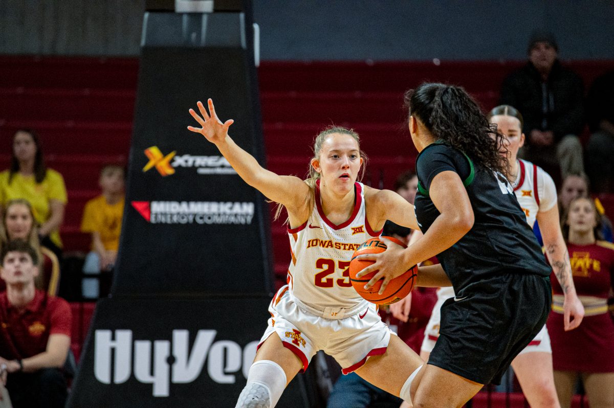 Kelsey Joens (23) for Iowa State keeps her eyes on the Upstate player with the ball she is guarding at Hilton Coliseum, Dec 3, 2024.