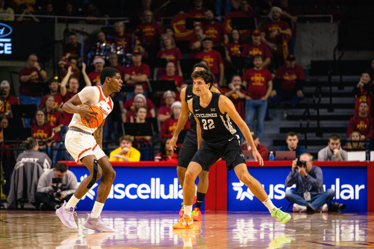 Milan Momcilovic (22) guards against Morgan State University during the NCAA men's basketball at Hilton Coliseum on Sunday, Dec. 22, 2024, in Ames, Iowa.