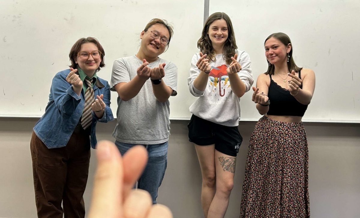 Members of Iowa State's K-Pop club pose for a photo at a recent meeting. 