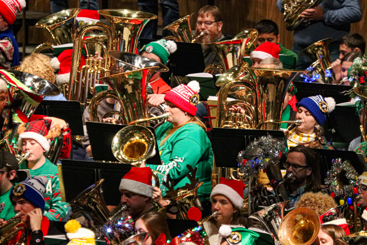 Tuba players of all skill sets show up in their festive outfits to the Ames TUBACHRISTMAS event located in Stephens Auditorium, Ames, Iowa.