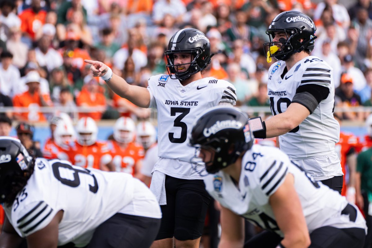 Quarterback Rocco Becht (3) gets ready for the snap during the game against the University of Miami in the Pop-Tarts Bowl, Camping World Stadium, Orlando, FL, Dec. 28, 2024.