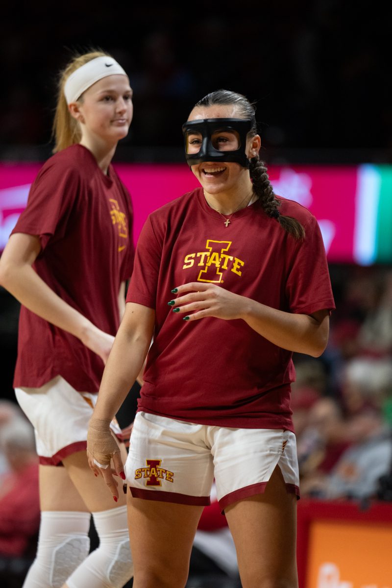 Reagan Wilson (24) laughs during warm-ups before the game vs. Eastern Illinois,Hilton Coliseum, Ames, Iowa, Dec. 15, 2024.
