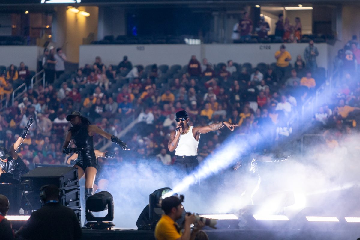 Ne-Yo performs during halftime of the championship game against the Arizona State Sun Devils at AT&T Stadium in Arlington Texas on December 7th, 2024.  