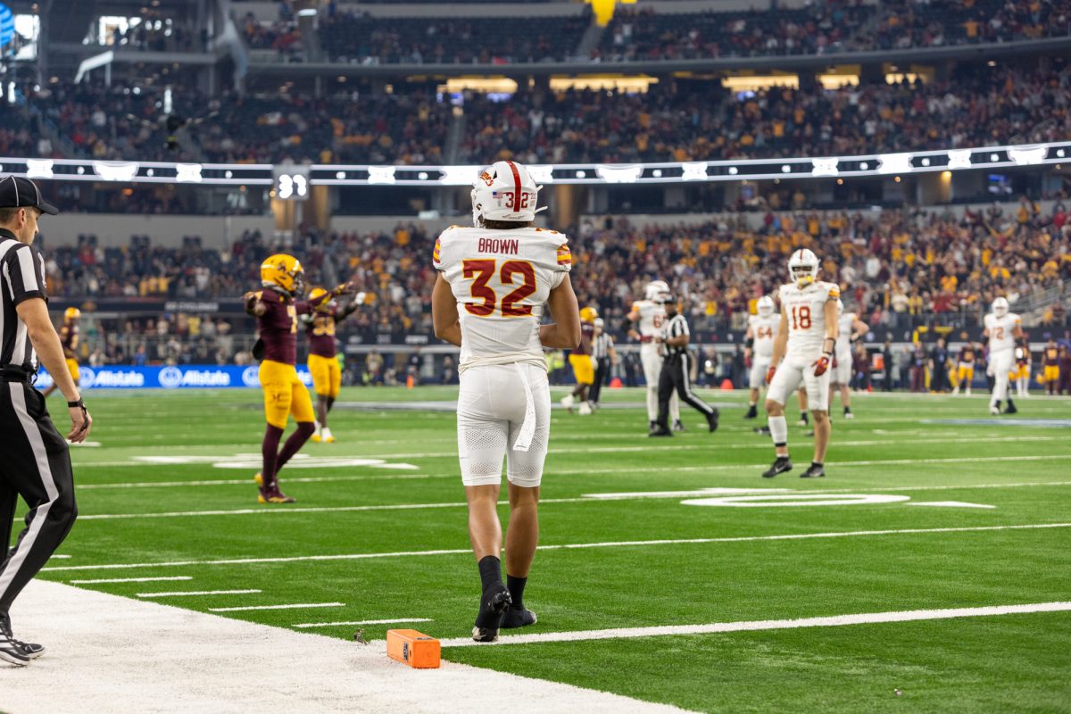 Carson Brown (32) walks back from the endzone as both teams wait for the referees to make a call duringthe championship game against the Arizona State Sun Devils at AT&T Stadium in Arlington Texas on December 7th, 2024.  