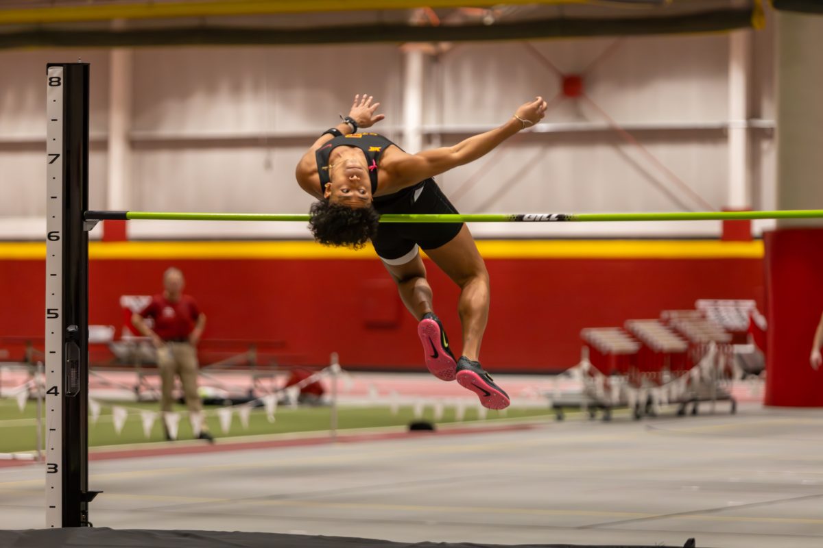 Thai Thompson, a Senior from Iowa State, sneaks his way over the bar during the Men's Heptathlon High Jump competition at the Iowa State Holiday track invitational, inside Lied Recreation Athletic Center, Ames, Iowa, Dec. 13, 2024. 