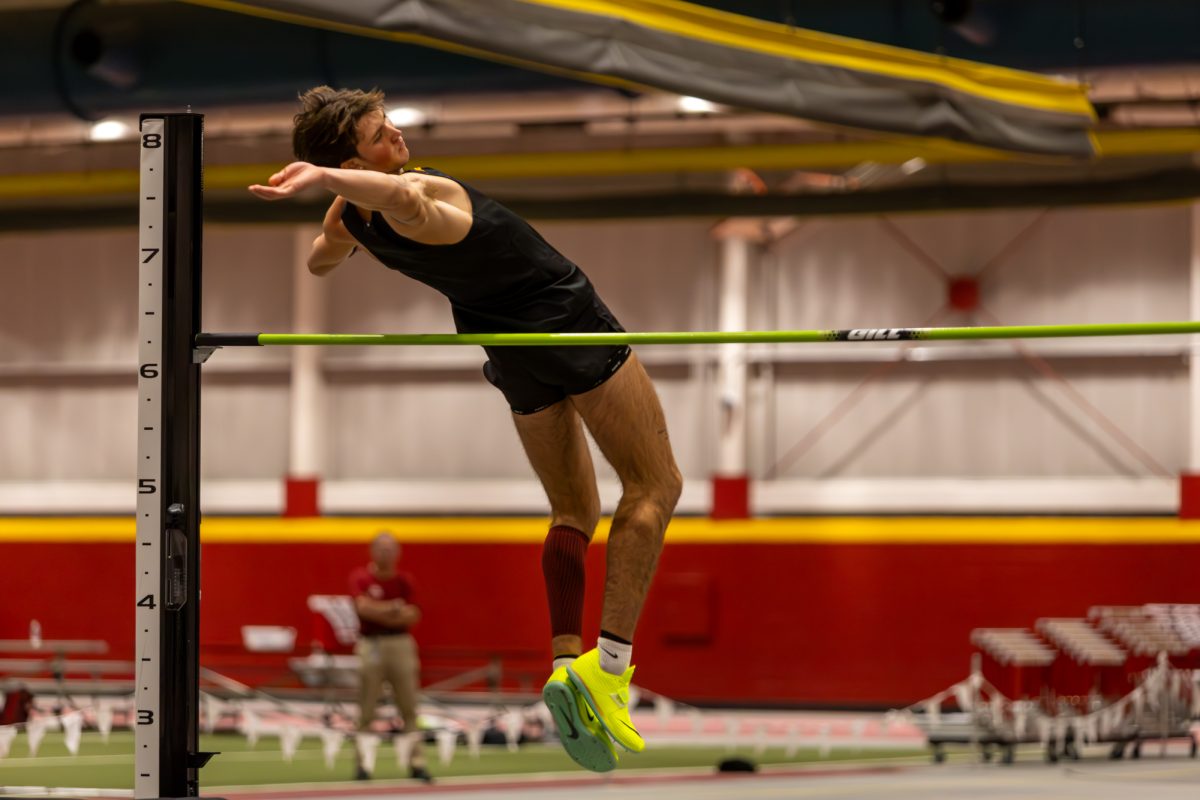 Chase Lathrop, a Freshman from Iowa State, clears the high jump bar during the Men's Heptathlon High Jump competition at the Iowa State Holiday track invitational, inside Lied Recreation Athletic Center, Ames, Iowa, Dec. 13, 2024. 