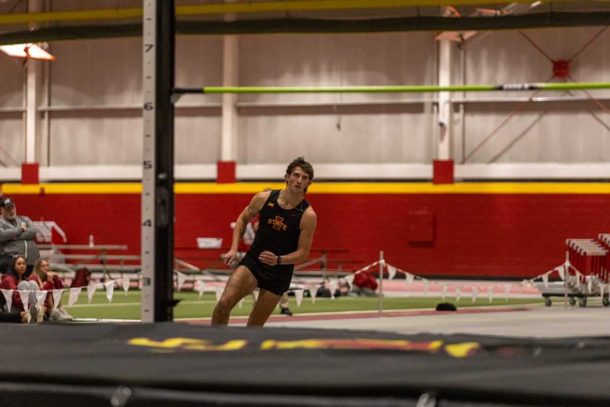 Chase Lathrop, a Freshman from Iowa State, prepares to jump over the high jump bar during the Men's Heptathlon High Jump competition at the Iowa State Holiday track invitational, inside Lied Recreation Athletic Center, Ames, Iowa, Dec. 13, 2024. 