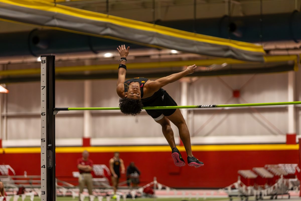 Thai Thompson, a Senior from Iowa State, sneaks his way over the bar during the Men's Heptathlon High Jump competition at the Iowa State Holiday track invitational, inside Lied Recreation Athletic Center, Ames, Iowa, Dec. 13, 2024. 