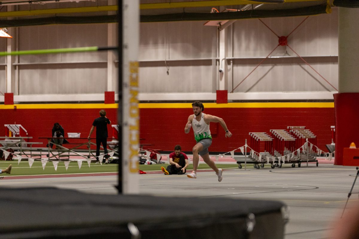 Ethan Peters runs towards the bar in during the Men's Heptathlon High Jump competition at the Iowa State Holiday track invitational, inside Lied Recreation Athletic Center, Ames, Iowa, Dec. 13, 2024. 