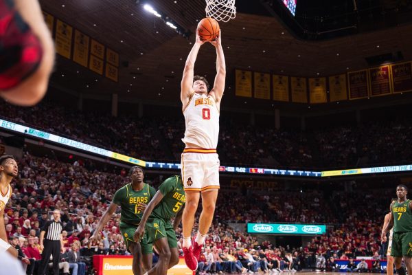 Nate Heise (0) soars to dunk the ball during the Iowa State vs. Baylor University basketball game, Hilton Coliseum, Jan. 4, 2025.