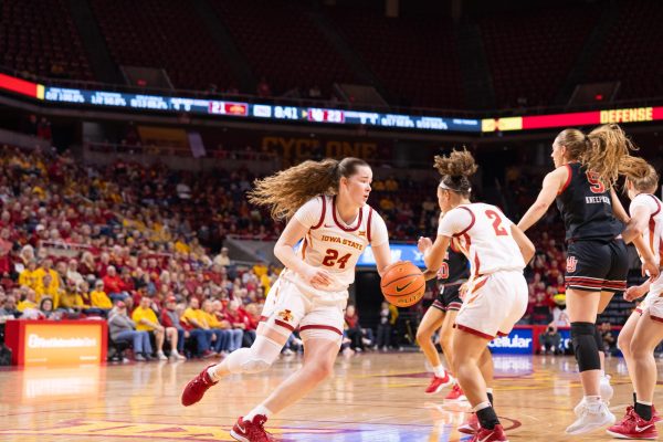 Addy Brown (24) dribbles past defenders during the Iowa State vs. University of Utah basketball game, Hilton Coliseum, Jan. 5, 2025.