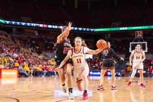 Emily Ryan (11) pushes against a defender trying to score during the Iowa State vs. University of Utah basketball game, Hilton Coliseum, Jan. 5, 2025.