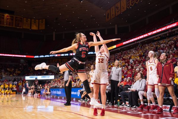 Aili Tanke (32) attempts a 3-pointer over a defender during the Iowa State vs. University of Utah basketball game, Hilton Coliseum, Jan. 5, 2025.