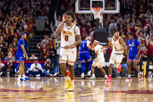 Curtis Jones (5) celebrates after a made three pointer during the Iowa State vs. University of Kansas men's basketball game, Hilton Coliseum, Ames, Iowa, Jan. 15, 2025.