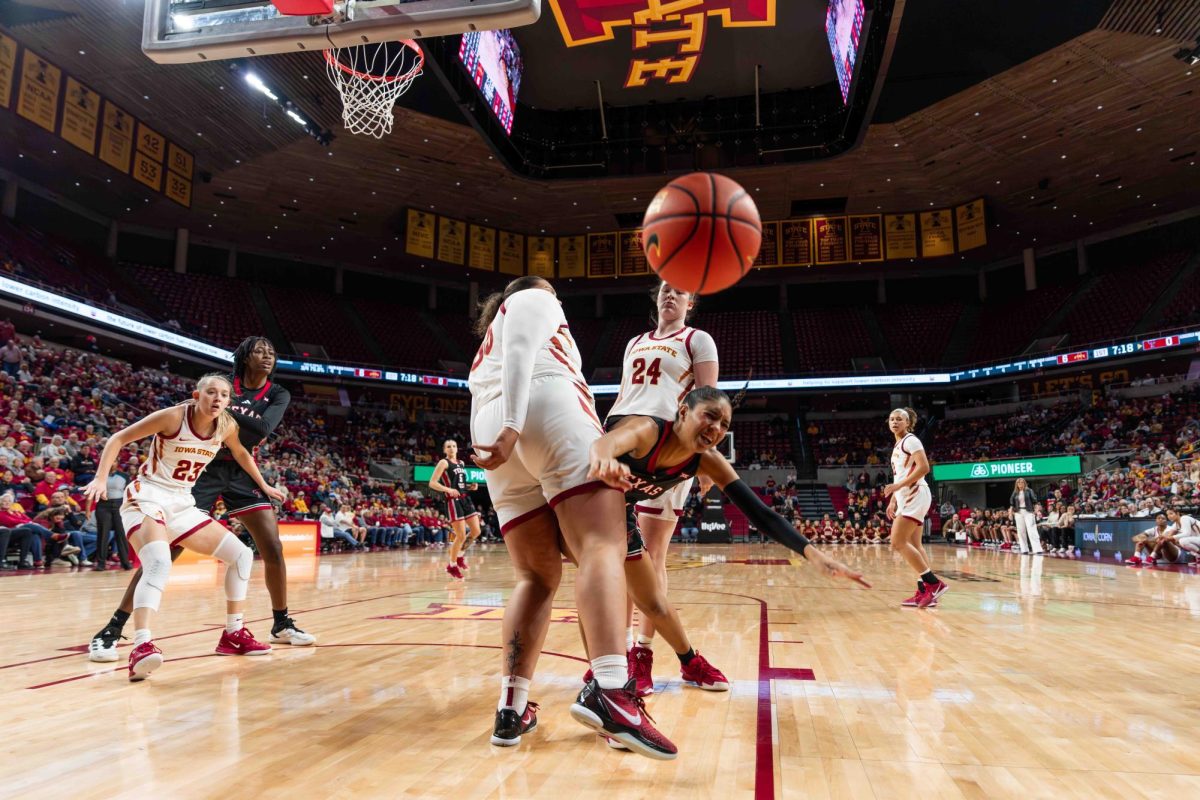 Audi Crooks (55) blocks former teammate Jalynn Bristow (1) during the Iowa State vs. Texas Tech University women's basketball game, Hilton Coliseum, Ames, Iowa, Jan. 14, 2025.