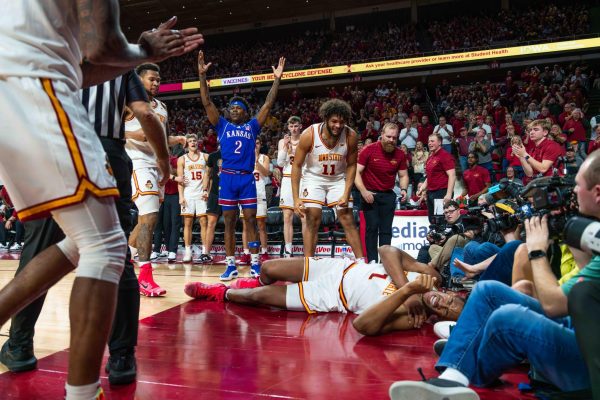 Dishon Jackson (1) gets fouled hard during the Iowa State vs. University of Kansas men's basketball game, Hilton Coliseum, Ames, Iowa, Jan. 15, 2025.