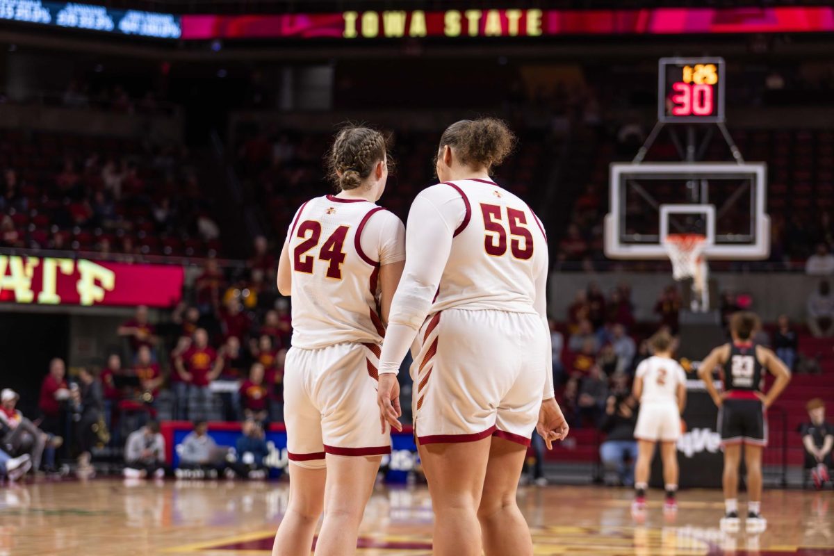 Addy Brown (24) and Audi Crooks (55) chat during the Iowa State vs. Texas Tech University women's basketball game, Hilton Coliseum, Ames, Iowa, Jan. 14, 2025.